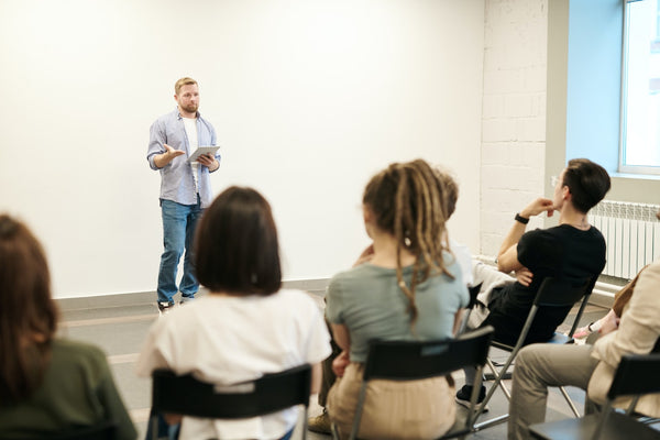 Man teaching how to market a dispensary