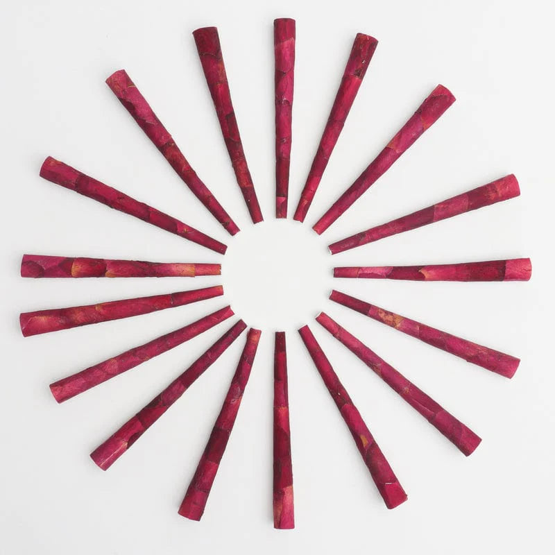 Circular display of empty rose flower pre rolled papers.